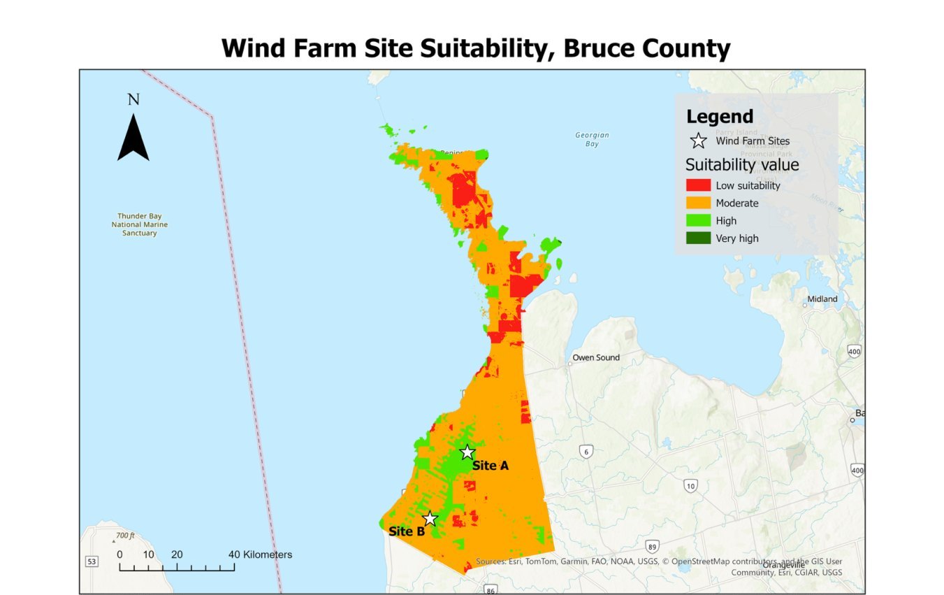 Weighted overlay suitability raster for wind farm siting across Bruce County, Ontario, with two recommended sites marked.